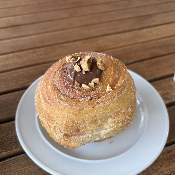 A sugared laminated pastry topped with chocolate hazelnut