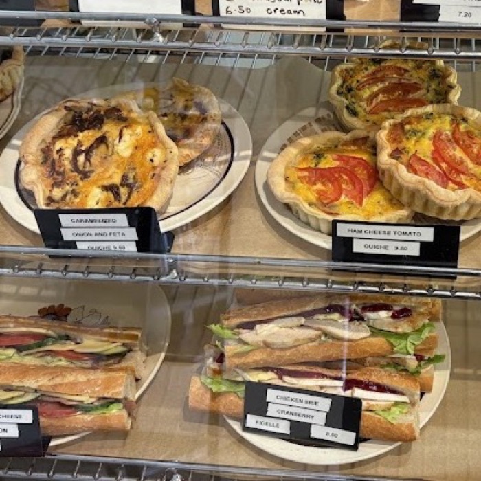 Quiches and filled baguettes in the cabinet
